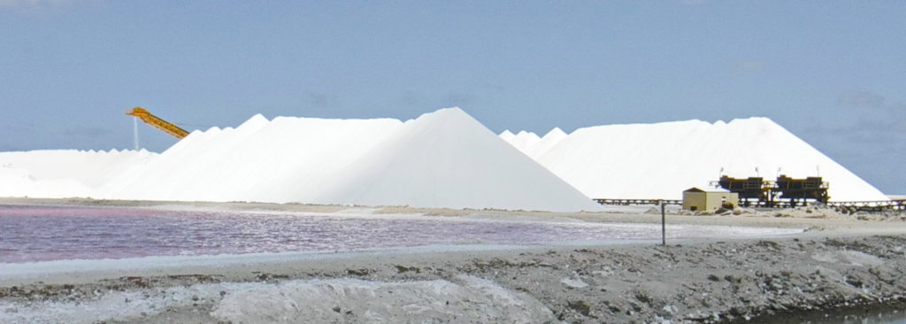Piles of salt harvested from the sea on Bonaire