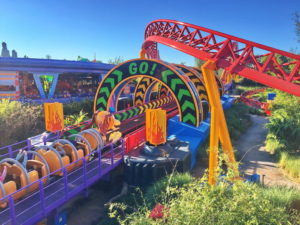 The Slinky Dog Coaster is bright, colorful, and loaded with fun details.